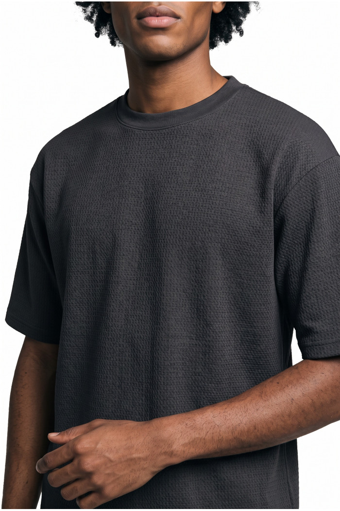 Camiseta unicolor oversize manga corta con corte posterior
