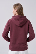 Buzo oversize con capota rosado oscuro y diseño college
