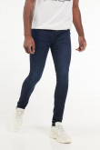 Jean súper skinny azul intenso con hilos en contraste y tiro bajo