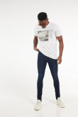 Jean súper skinny azul intenso con hilos en contraste y tiro bajo