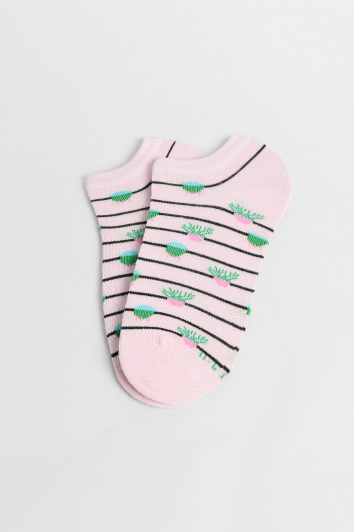 Medias unicolores tobilleras con diseño de plantas.