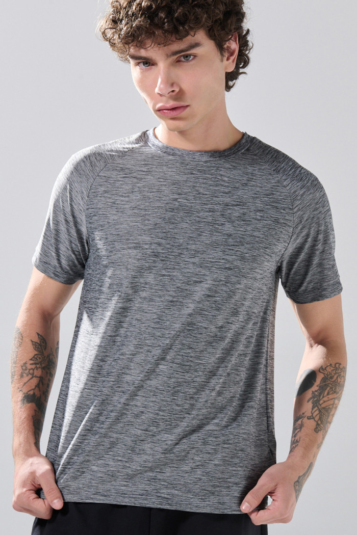 Camiseta unicolor con manga ranglan corta y estampados
