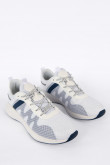 Tenis deportivos para hombre negros, con detalle en color contraste y suela blanca.