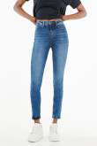 Jean azul oscuro tipo jegging tiro alto con botas cortas