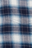 Blusa unicolor con estampado de cuadros y manga larga