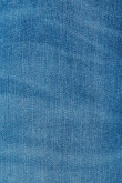 Jean súper skinny azul medio tiro bajo con detalles desteñidos