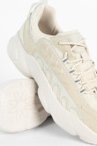Tenis chunky crema claro con materiales en contraste