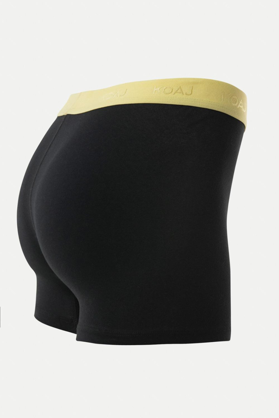 Bóxer negro tipo midway brief con elástico amarillo en la cintura