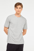 Camiseta gris clara con cuello redondo y detalles con efecto jaspe