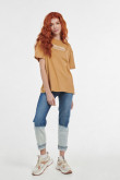 Camiseta cuello redondo oversize kaki con diseños urbanos