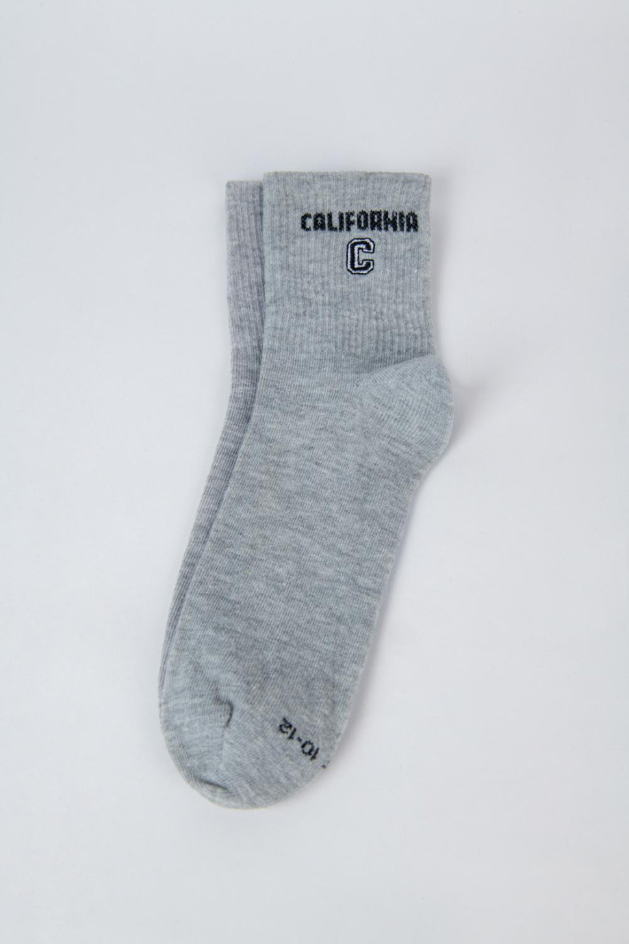 Medias unicolores cortas con motivo college de California