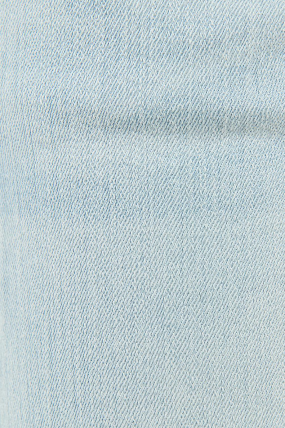 Jean azul claro súper skinny con costuras en contraste y tiro bajo