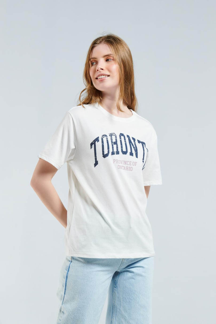 Camiseta crema clara con manga corta y diseño college de Toronto