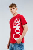 Camiseta manga corta rojo intenso con estampado de Coca-cola.