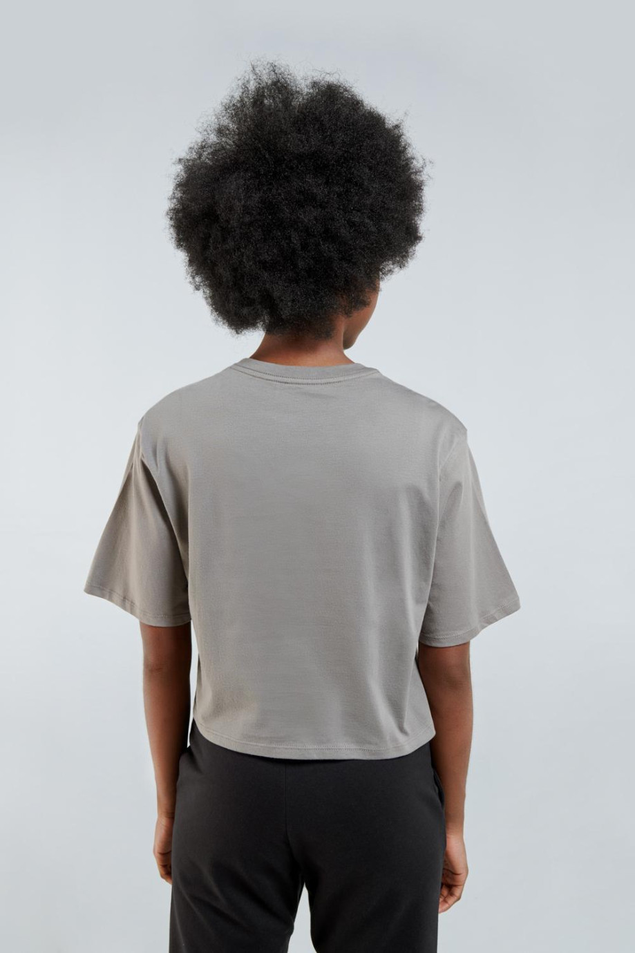 Camiseta unicolor oversize de silueta crop top con manga corta
