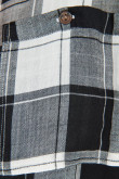 Blusa unicolor a cuadros con manga larga, bolsillos y cuello camisero