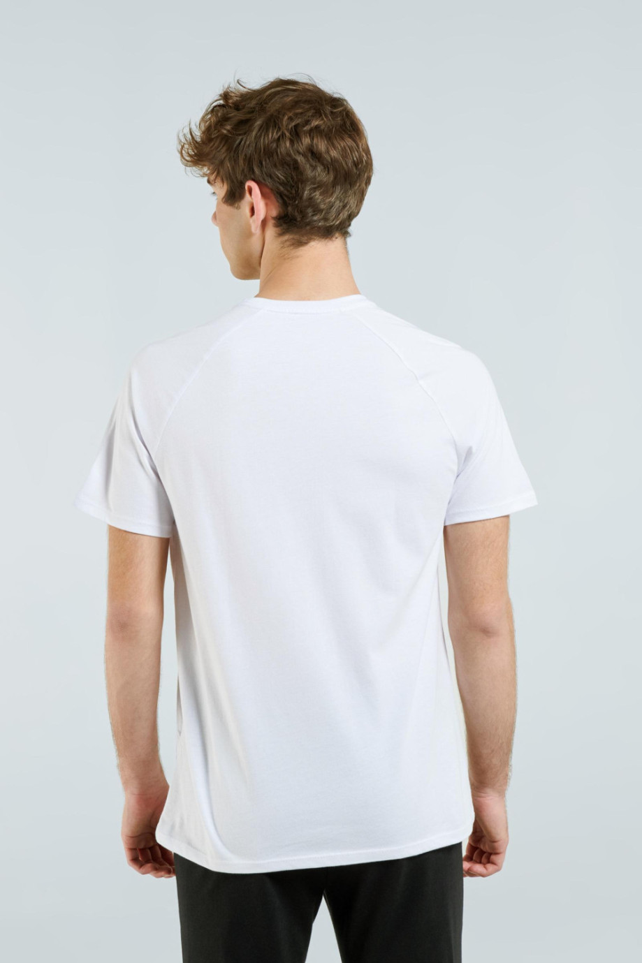 Camiseta manga ranglan corta unicolor con cuello redondo y ajuste ceñido