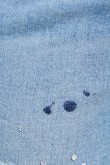 Jean súper skinny azul claro con rotos y diseños de manchas