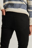 Jean súper skinny negro ajustado con bolsillos y tiro bajo