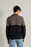 Suéter azul intenso tejido con cuello redondo y diseños de rayas