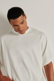 Camiseta oversize crema manga corta con diseño en espalda