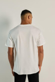 Camiseta crema manga corta con diseño college de Brasil