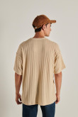 Camiseta unicolor oversize con texturas y cuello redondo