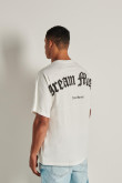 Camiseta crema manga corta oversize con diseño en espalda