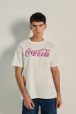 Camiseta crema clara manga corta con texto de Coca-Cola