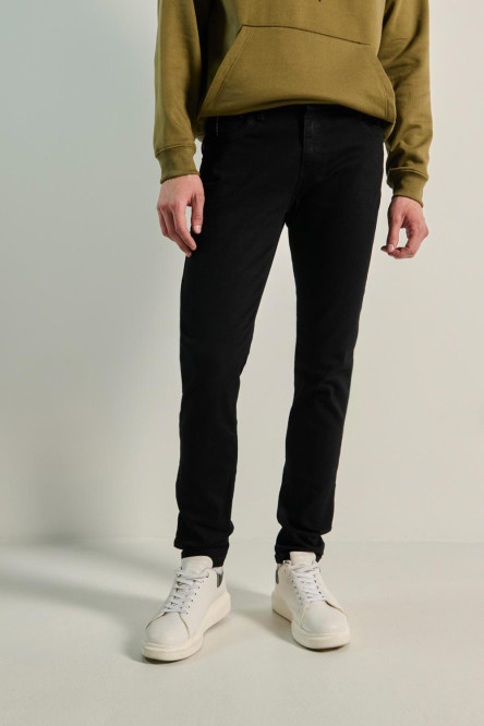 Jean tiro bajo súper skinny negro con bolsillos y cremallera