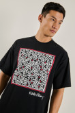 Camiseta manga corta negra oversize y diseño de Keith Haring