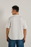 Camiseta oversize unicolor con hombro rodado y manga corta