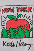 Camiseta blanca oversize manga corta y arte de Keith Haring