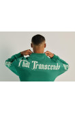 Buzo oversize verde con cuello redondo y diseños de textos