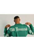 Buzo oversize verde con cuello redondo y diseños de textos
