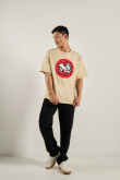 Camiseta oversize kaki manga corta con arte de Keith Haring