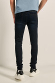 Jean súper skinny azul intenso con tiro bajo y fit ceñido