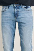 Jean skinny tiro bajo azul con desgastes y ajuste ceñido