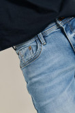 Jean skinny tiro bajo azul con desgastes y ajuste ceñido