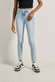 Jean tiro alto jegging azul claro ajustado con desgastes