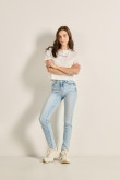 Jean jegging tiro alto azul con desgastes y ajuste ceñido