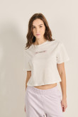 Camiseta crema clara crop top con diseño racer en frente