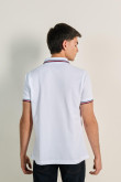 Camiseta polo unicolor con detalles tejidos y botones