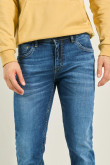 Jean azul oscuro skinny tiro bajo con bolsillos y desgastes