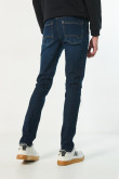 Jean skinny tiro bajo azul oscuro ajustado con 5 bolsillos