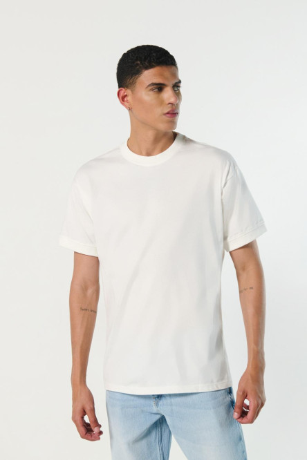 Camiseta unicolor oversize con cuello redondo y puños en rib