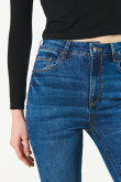 Jean jegging azul oscuro con tiro súper alto y 5 bolsillos