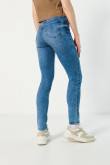 Jean jegging súper tiro alto azul claro y desgastes sutiles