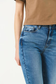 Jean jegging súper tiro alto azul claro y desgastes sutiles