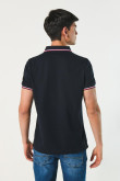 Camiseta unicolor polo con tejido en puños y cuello